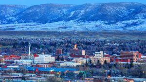 Picture of a snowy Casper with Casper Mountain